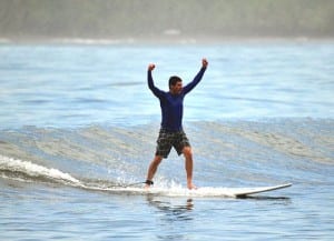 Experience the thrill of surfing taking lessons at Pranamar Villas in Costa Rica