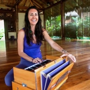Pranamar Villas yoga instructor Nancy Goodfellow plays a harmonizer for chanting