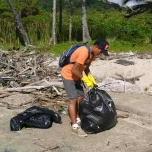 Bagging beach trash, Playa Santa Teresa, Costa Rica