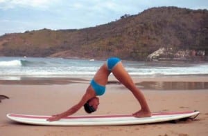 Yoga pose downward dog for surfers