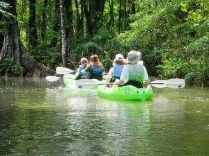 Traveler enjoying a scenic Costa Rica landscape with rainforest, volcanoes, and tropical nature